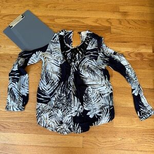 Nicole Miller 100% Viscose blouse with cut out detail.